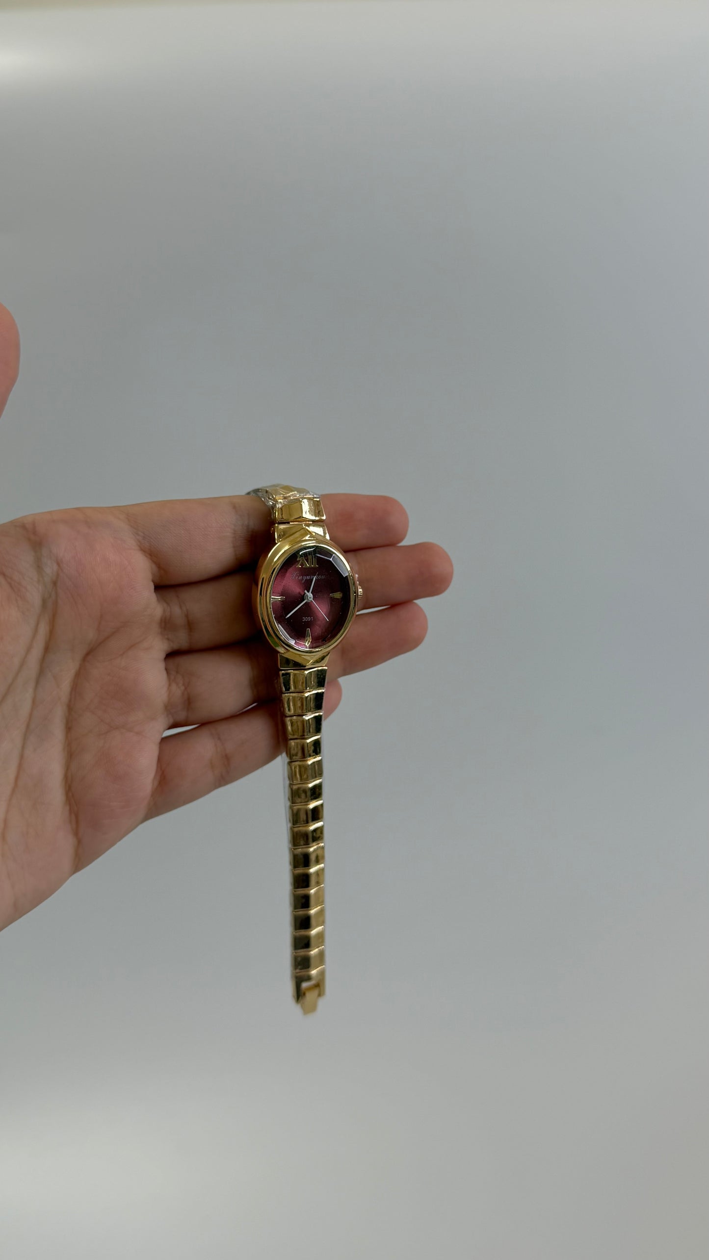 Gold Tone Maroon Oval Watch